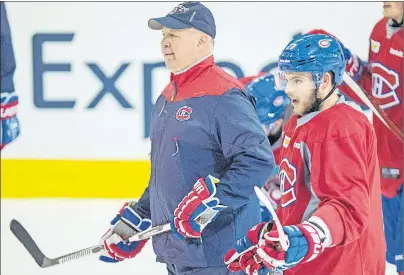  ?? CP PHOTO ?? Montreal Canadiens’ Alex Galchenyuk and head coach Claude Julien watch during a practice Monday in Brossard, Que. The Canadiens will face the New York Rangers in the first round of playoffs.