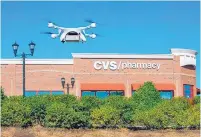  ??  ?? A UPS Flight Forward drone taking off during the first residentia­l delivery of prescripti­on medication for CVS in Cary, North Carolina.
