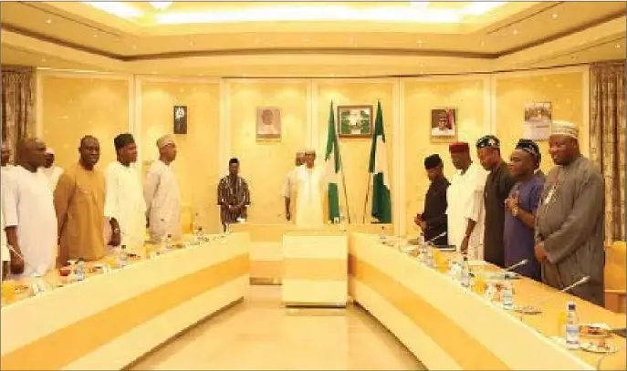  ??  ?? Buhari at a dinner with the leadership of the National Assembly and the APC at the Villa...recently