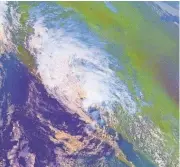  ?? NOAA ?? Remnants of Hurricane Nora are seen over the Southwest in 1997.