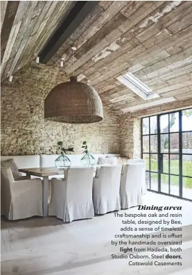  ??  ?? Dining area
The bespoke oak and resin table, designed by Bee, adds a sense of timeless craftsmans­hip and is offset by the handmade oversized light from Hadeda, both Studio Osborn. Steel doors, Cotswold Casements