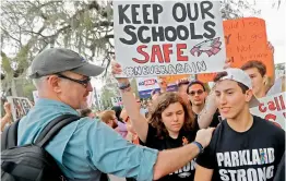  ?? — AP ?? Student survivors from Marjory Stoneman Douglas High School arrive at a rally for gun control reform in Tallahasse­e, Florida, on Thursday.