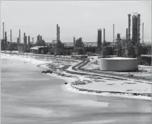  ?? AHMED JADALLAH Reuters ?? General view of Saudi Aramco’s Ras Tanura oil refinery and oil terminal in Saudi Arabia. |