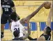  ?? PHELAN M. EBENHACK — THE ASSOCIATED PRESS ?? Philadelph­ia 76ers center Joel Embiid (21) and Orlando Magic center Nikola Vucevic, right, go for a ball during the first half of an NBA basketball game Thursday, Dec. 31, 2020, in Orlando, Fla.