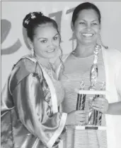  ?? GINA photo) (DPI/ ?? Jan Gomes receiving an award from Dr. Raquel Thomas-Caesar