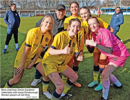  ?? DAVE VOKES ?? Boro chairman Simon Gardener celebrates with some Farnboroug­h Women players at full-time
CRAIG Shields’ Farnboroug­h Women created a piece of history by reaching the Hampshire FA Women’s Trophy final, after a hard-fought 2-1 home victory over AFC Varsity Women last Sunday.
Goals from Ellie Stalley and Leah Lakritz helped see off their opponents from two divisions above.
Boro Women can now look forward to an end of season showpiece final against Bursledon Ladies on Sunday, May 12.
The Hampshire FA Women’s Trophy final is set take place at Stoneham Lane Football Complete, with a 4.30pm kick-off.