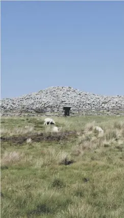  ??  ?? 0 Camster Cairns in Caithness were built around 5,000 years ago