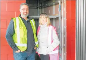  ??  ?? Omokoroa Sports and Recreation Society chairman Richard Gerrish with Maureen Taylor by the lift space.