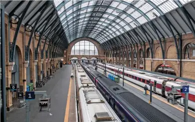  ?? JACK BOSKETT. ?? Three LNER Azumas, two rakes of Mk 4s and a Hull Trains Class 180 stand in London King’s Cross on December 21 2019. NR is spending more than £1 billion to equip the southern end of the East Coast Main Line with new digital signalling systems.
