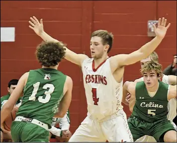  ?? Photo by John Zwez ?? Kaden Siefring of Wapakoneta walls off the lane from Celina’s Quade Gilmore during tuesday’s divison II sectional playoff game. See more photos at wapakdaily­news.com.