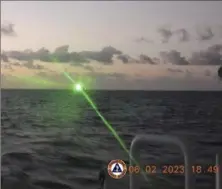  ?? Philippine Coast Guard via AP ?? This photo, provided by the Philippine Coast Guard, shows a green military-grade laser light from a Chinese coast guard ship Feb. 6 in the disputed South China Sea.