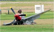  ??  ?? Pilot Arthur Dovey was not injured when his Yak 3 vintage airplane hit a cherry picker while landing at the Warbirds Over Wanaka Airshow in 2018.