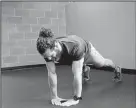  ??  ?? Rib it: Eric Godwin does the Frogger Pushup at Little Rock Athletic Club.