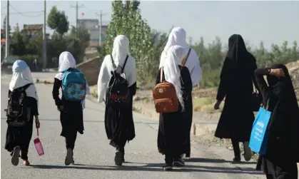  ?? Photograph: AFP/Getty Images ?? A year after the Taliban took power in Afghanista­n, teenage girls are still barred from school and women are required to cover themselves from head to toe in public.