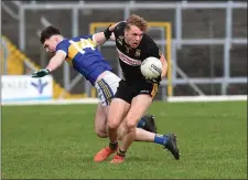  ??  ?? Alan Dineen Scoil Phobail Sliabh Luachra Rathmore challanged by Sean Quilter Tralee CBS in the Corn Uí Mhuirí semi-final in the Fitzgerald Stadium, Killarney. Photo by Michelle Cooper Galvin