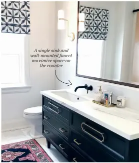  ??  ?? A single sink and wall-mounted faucet maximize space on the counter
