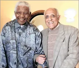  ??  ?? Former president Nelson Mandela joins anti-apartheid veteran Ahmed Kathrada in Houghton, Johannesbu­rg, in 2009.