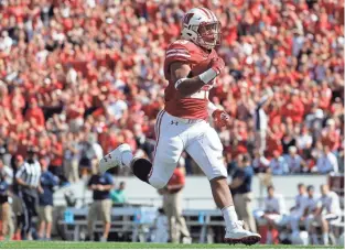  ?? ASSOCIATED PRESS ?? Wisconsin freshman tailback leads the Big Ten in rushing with 146 yards a game.