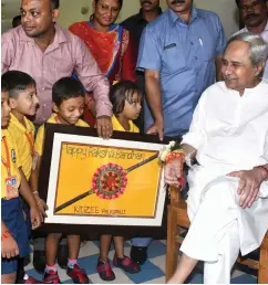  ??  ?? Odisha CM and BJD chief Naveen Patnaik interacts with children. ( Right) Union petroleum minister Dharmendra Pradhan at an event in Bhubaneswa­r.