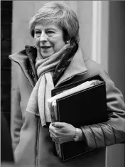  ?? AP PHOTO/ALASTAIR GRANT ?? BRITAIN’S PRIME MINISTER Theresa May leaves 10 Downing Street for the House of Commons for her weekly Prime Minister’s question time in London Wednesday.