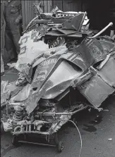  ?? GETTY IMAGES ?? Mangled: remains of his car