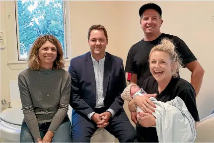  ?? SUPPLIED ?? Northern Southland Health Company chairwoman Carrie Adams, CluthaSout­hland MP Hamish Walker, and new parents Harry Dickson and Beth Kay with baby Bella.