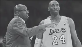  ?? STEPHEN DUNN/ GETTY IMAGES ?? Only five games into the current NBA season, the Lakers and Kobe Bryant have parted ways with head coach Mike Brown.