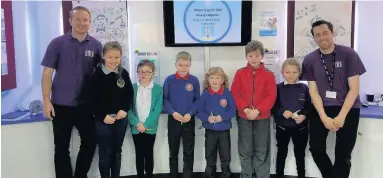  ??  ?? ● Children from Ysgol Yr Hendre with the team from the National Deaf Children’s Society Roadshow