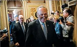  ?? DREW ANGERER/GETTY ?? Senate Minority Leader Chuck Schumer leaves a meeting with Senate Democrats.