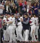  ?? DAVID DERMER — ASSOCIATED PRESS ?? Indians players applaud the fans after their win streak was snapped Sept. 15.