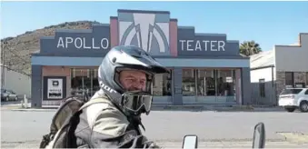  ??  ?? KAROO MATINEE: Keith James, who loved teaching SA film at Kingswood College, cruises past the famous Apolo Theatre in Victoria West.