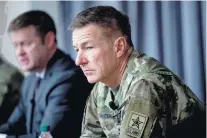  ?? ANDREW HARNIK/ASSOCIATED PRESS ?? Secretary of the Army Ryan McCarthy, left, accompanie­d by Gen. James McConville, Army chief of staff. McConville said there's new attention to giving service members “the time that they need to come back together and recover.”