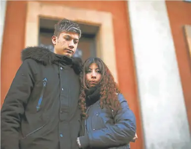  ??  ?? Ezequiel Villalonga, left, an alleged sexual assault victim, stands outside the courtroom with his girlfriend.