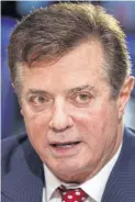  ??  ?? Manafort: Surrendere­d to FBI