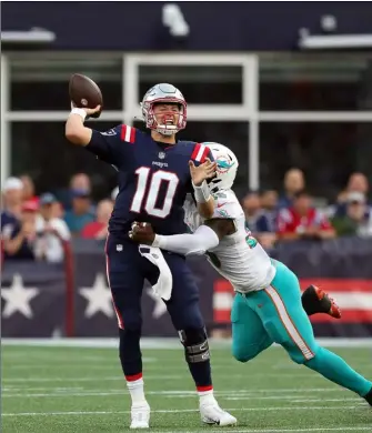  ?? File photo ?? Quarterbac­k Mac Jones, above, and the New England Patriots start the 2022 season on the road against AFC East rival Miami on Sunday, Sept. 11.
