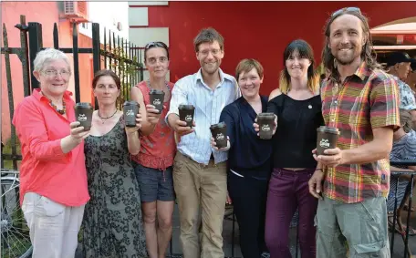  ??  ?? Transition Town Chorca Dhuibhne members Máire Uí Léime, Manuela Dei Grandi, Breda Enright, Jindrich Staneck, Kerry County Council Environmen­tal Awareness Officer Oonagh O’Connor, Sarah Hegarty and Darach Ó Murchú with the Dingle Cupán - a recyclable...