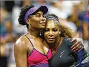  ?? JULIAN FINNEY / GETTY IMAGES ?? Venus Williams (left) congratula­tes sister and opponent Serena Williams after the third-round match on Day 5 of the U.S. Open in New York.