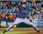  ?? MICHAEL WYKE — THE ASSOCIATED PRESS ?? Seattle pitcher Yusei Kikuchi pitched 6 2/3 hitless innings against Houston on Thursday. He ended up allowing one hit in seven innings.