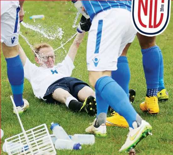  ??  ?? ABOVE: Last year’s winner Wealdstone re-enact Paul Gascoigne’s Dentist Chair celebratio­n