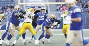  ?? JOHN WOODS/ THE CANADIAN PRESS ?? Quarterbac­k Matt Nichols passes against the Eskimos in CFL pre-season action Friday in Winnipeg.