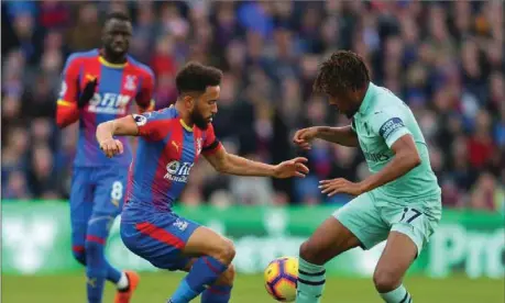  ??  ?? Alex Iwobi (right) was fine form against Crystal Palace despite Arsenal’s 11-game winning streak halted…yesterday