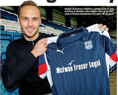  ??  ?? Badge of honour: Hateley cannot wait to get started at Dundee after angry fans at his last club in Poland demanded the shirt off his back