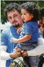  ?? Associated Press ?? Ever Reyes Mejia, of Honduras, is reunited with his son.