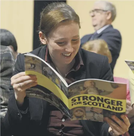  ?? PICTURE: SWNS: ?? 0 Scotland’s youngest MP, Mhairi Black, reads the SNP’S manifesto at its launch in Perth