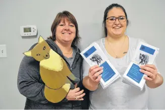  ?? ERIC MCCARTHY/JOURNAL PIONEER ?? Tignish Recreation director Tina Richard, left, and recreation assistant Brianna Butler are excited about presenting the town’s 33rd annual winter carnival. The winter carnival runs Feb. 17 to 24. The first clue as to the location of the silver fox will be posted Feb. 18.
