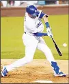  ??  ?? Los Angeles Dodgers’ A.J. Pollock hits a solo home run during the fourth inning of the team’s baseball game against the Oakland Athletics on
Sept 22, in Los Angeles. (AP)