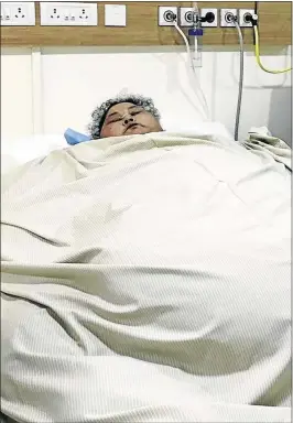  ?? PHOTO: AFP ?? Eman Ahmed Abd El Aty from Egypt rests in bed at Saifee Hospital in Mumbai ahead of a Bariatric operation, a stomach-shrinking bypass procedure.