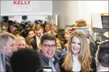  ?? ALYSSA POINTER/ALYSSA.POINTER@AJC.COM ?? A crowd of supporters crammed into the Cobb County Republican Party headquarte­rs in Marietta for a campaign rally Monday for U.S. Sen. Kelly Loeffler, apparently not concerned about catching the contagious coronaviru­s.