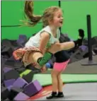  ?? MICHILEA PATTERSON — DIGITAL FIRST MEDIA ?? Lily Melton, 6, does a high jump on a trampoline at the Get Air Trampoline Park in King of Prussia on Wednesday.