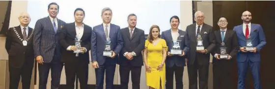  ?? Photos by JOEY VIDUYA ?? (From left) SKAL Internatio­nal- Makati president Robert Lim Joseph Jr., Solaire Resort and Casino COO Thomas Arasi, Megawide Corp. chairman Michael Cosiquien, Travellers Internatio­nal Hotel Group Inc.’s Kingson Sian, New World Makati Hotel resident...